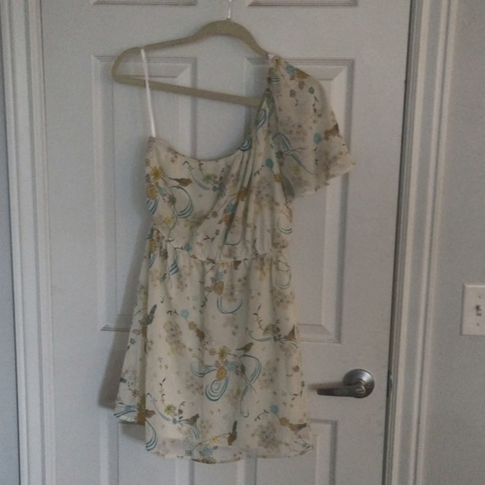 One shouldered mini dress with birds and flowers. Light chiffon fabric.